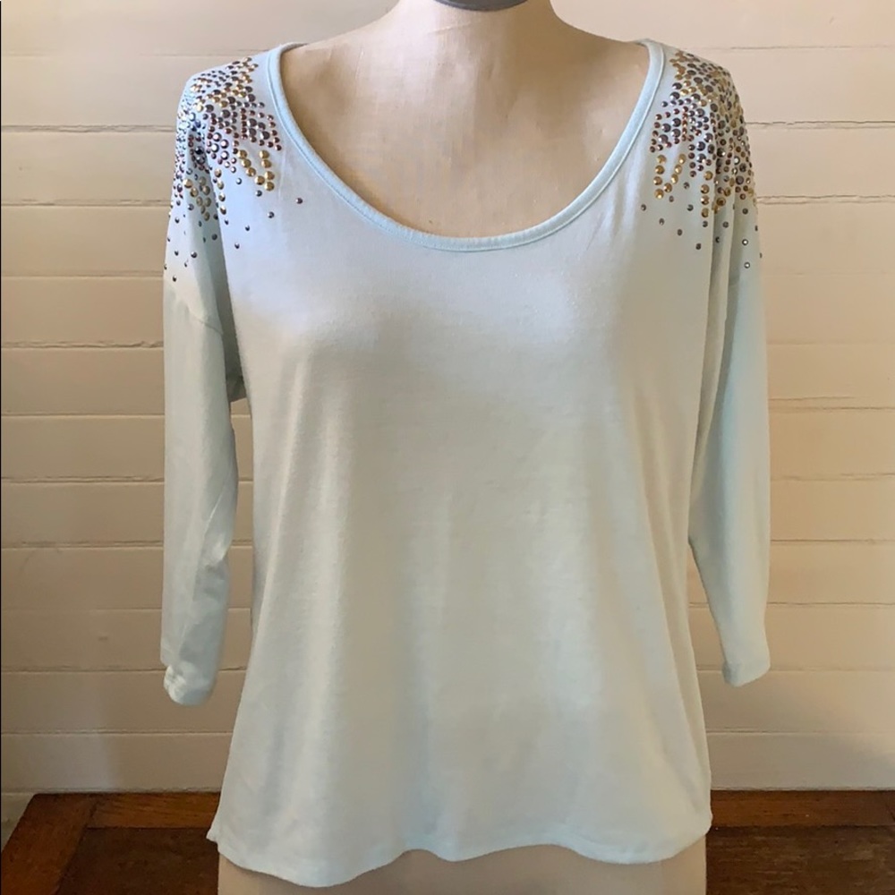 Lovely jewel shoulder blouse.